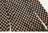 Deconstructing long-sleeved checkerboard dress with hollow waist