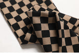 Deconstructing long-sleeved checkerboard dress with hollow waist